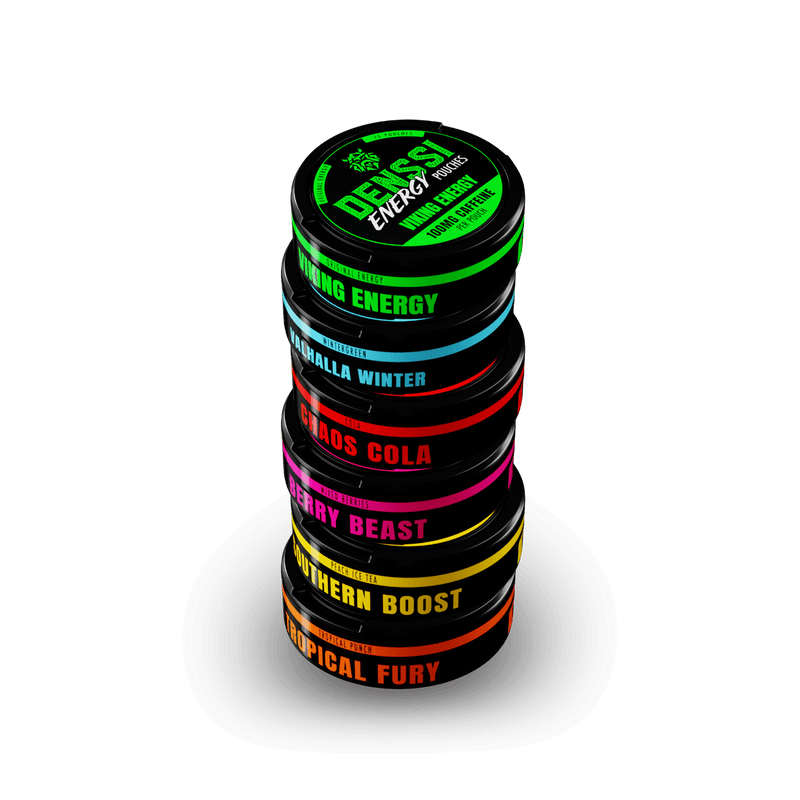 Denssi Energy Pouches Variety Pack OG Stack image with all 6 Denssi energy pouch flavors stacked. Tropical Fury (orange) at the bottom, Southern Boost (yellow), Berry Beast (pink), Valhalla winter (blue), chaos cola (red), and Viking energy green) on a transparent background 
